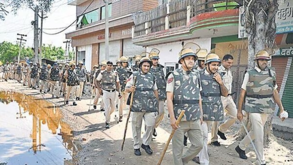 muslim-shops-damaged-by-armed-men