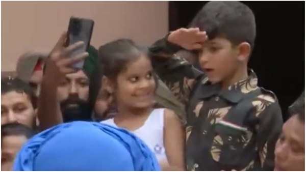 Son Pays Tribute in Military Uniform to Colonel Who Lost His Life in Kashmir Action Son Pays Tribute in Military Uniform to Colonel Who Lost His Life in Kashmir Action