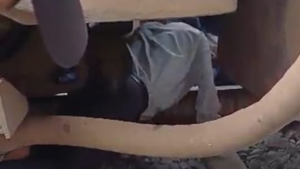 teacher-stuck-in-railway-track-at-davanagere