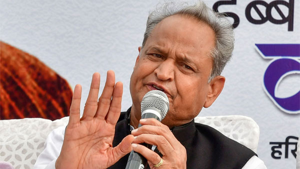  Gehlots Five Guarantees: OPS Law, Affordable Laptops, Cow Dung at ₹2/kg for College Students