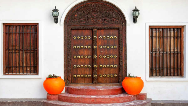 vastu tips keep these 4 symbols on the main door to attract luck and prosperity in kannada