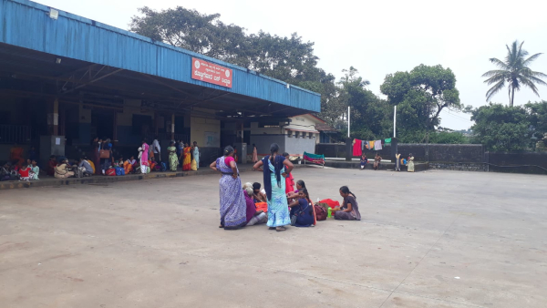 Women passengers washing clothes at KSRTC bus stand in Kottigehara