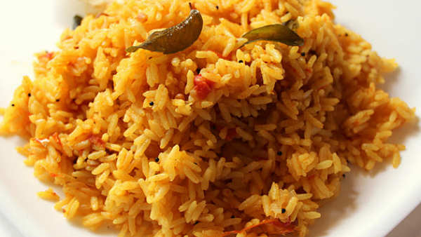 Spicy Tomato Rice Recipe: how to make Spicy Tomato Rice at home in Kannada