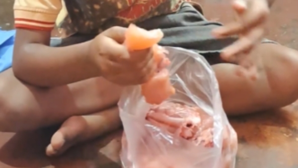 A Video Of A Little Boy Eating Raw Chicken Goes Viral