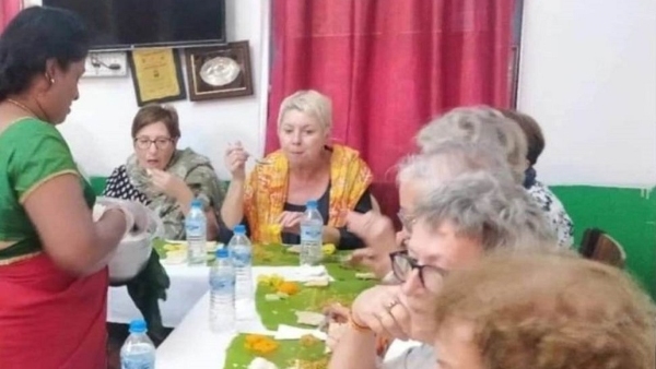 Shashikala Is Serving Food To The Foreigners In Mysuru 