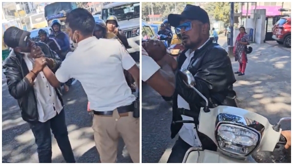 A Man Assaulted and bit Bengaluru traffic Police Constables In Public