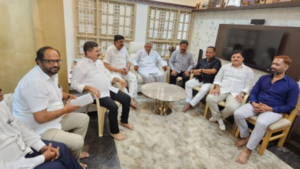 Why did the M P Renukacharya team express outrage against G M Siddeshwara