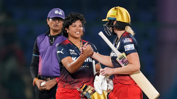 RCB Clinches Playoff Spot with Commanding 7-Wicket Victory Against MI