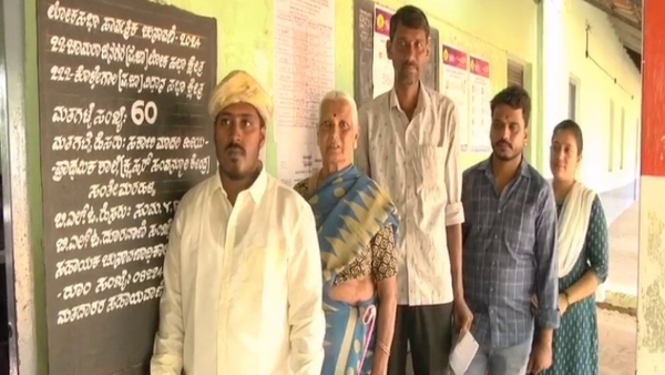 Before voting then marriage Bride and groom who voted before marriage in Chamarajanagar Before voting then marriage Bride and groom who voted before marriage in Chamarajanagar