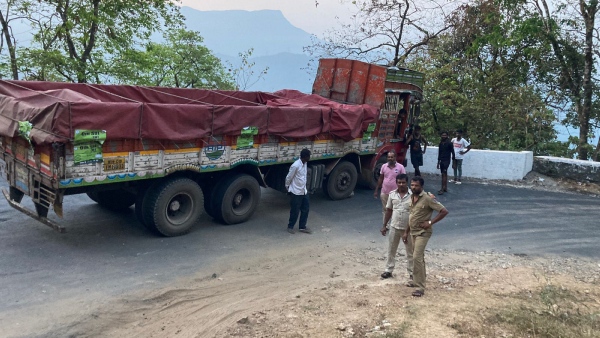 A 12 wheeler lorry Stuck at Charmadi Ghat