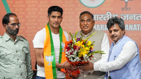 Lok sabha election 2024 Boxer and former Congress leader Vijender Singh joins BJP