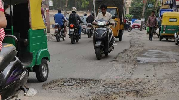 minister parameshwara questions bjp for potholes issue says potholes are normal during rainy season