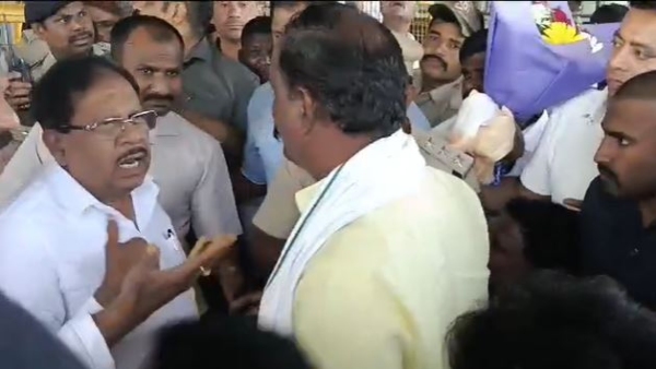 G Parameshwar s visit to Hubballi Minister s car blocked at airport to oppose transfer of DCP