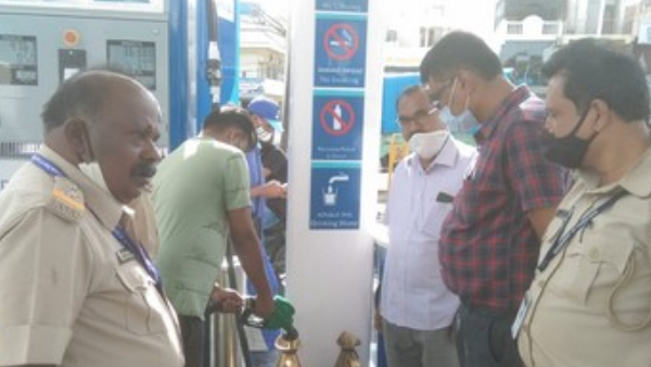 Petrol Bank Scam Men who fill petrol while talking on mobile beware