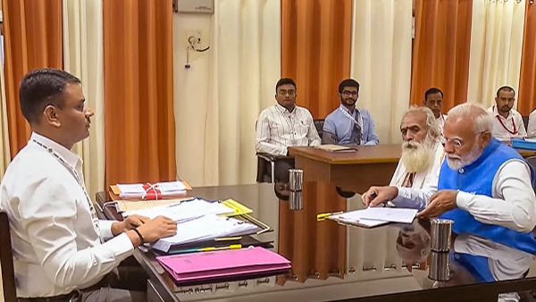 Do you know the Person who was beside PM Narendra Modi during the election nomination