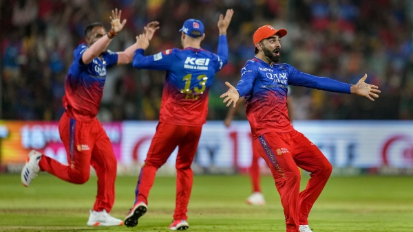 RCB vs DC RCB Clinch Fifth Consecutive Victory Keeping Playoff Dreams Alive