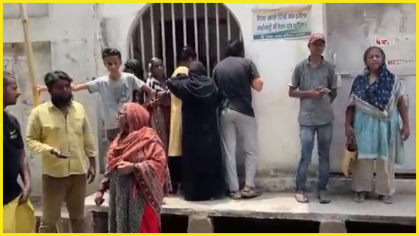 Women line up at Lucknow Congress office demanding guarantee card of Rs 1 lakh