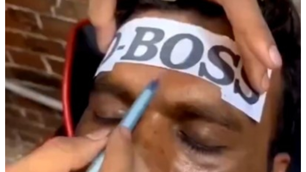 Darshan Thoogudeepa A fan Gets D Boss Tattooed on His forehead video viral