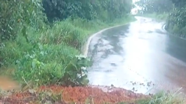 Heavy rain at Charmadi Ghat foothills Rocks rolled down on road