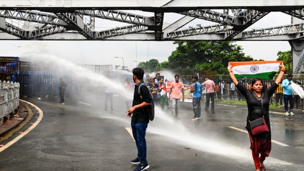 Kolkata Protests Erupt Police Deploy Water Cannons Tear Gas Against Demonstrators