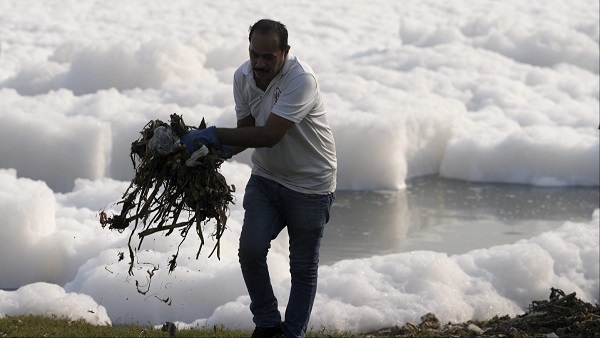 Polluted Yamuna River in Delhi Thick foam hinders Chhath Puja