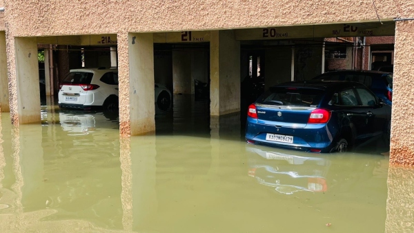 Due To Rain In Bengaluru Apartment People Were Given A Drop In A Tractor