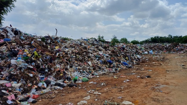 People of Assam State At The Solid Waste Disposal Plant Near Karivaradharaja Hill