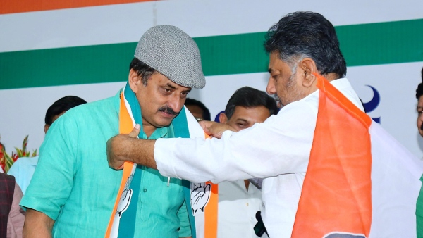 channapatna by election result- cp yogeshwar leads in channapatna - workers celebration reaches peak