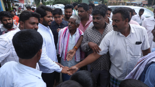 Activists shouted slogans that Nikhil Kumaraswamy will win