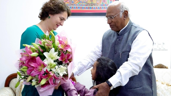 AICC President Mallikarjun Kharge Fed Sweets To Priyanka Gandhi Who Won In Wayanad