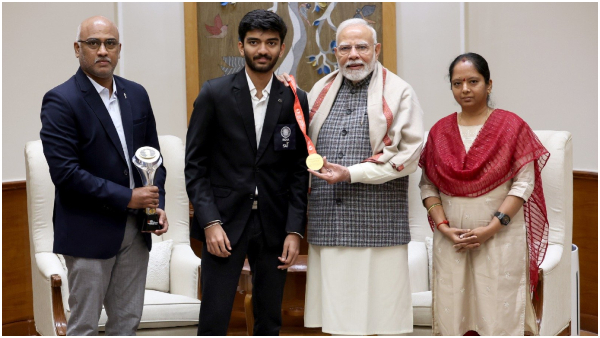 pm narendra modi meets d gukesh after world chess championship win pm narendra modi meets d gukesh after world chess championship win