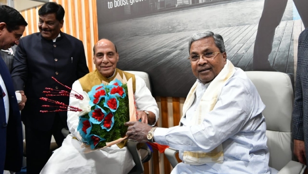 Cm siddaramaiah attends summit in wheelchair raises concerns