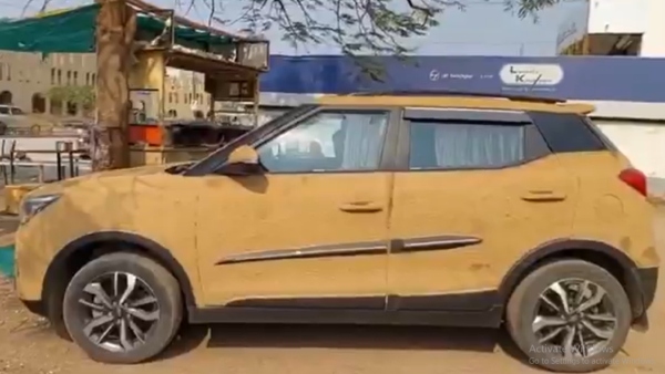 Doctor Applies Cow Dung Coating On Mahindra Car For Cooling Viral Video