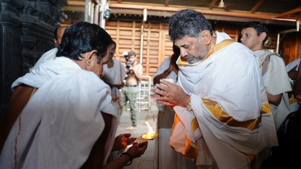 DK Shivakumar visit Dharmasthala secret meeting Veerendra Heggade