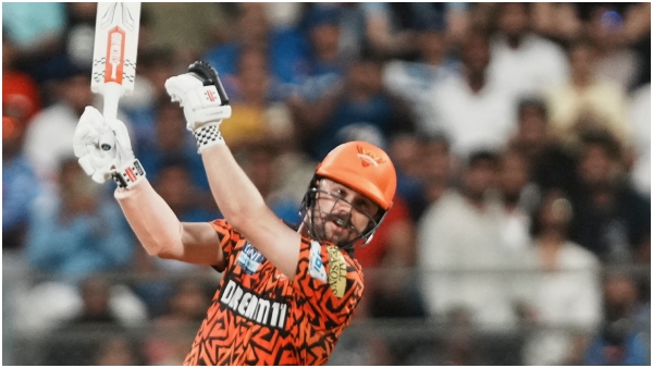 Rcb sue taxi hailing company for viral ad travis head srh ipl 2025