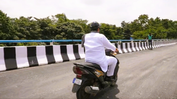 DCM DK Shivakumar Rides Dio Scooter With 18 500 Rupees Fine On Hebbal Flyover Sparks Buzz DCM DK Shivakumar Rides Dio Scooter With 18 500 Rupees Fine On Hebbal Flyover Sparks Buzz