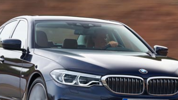 BMW 5 Series with Dual Number Plates Busted in Hyderabad High-Tech Trick to Evade Police Viral