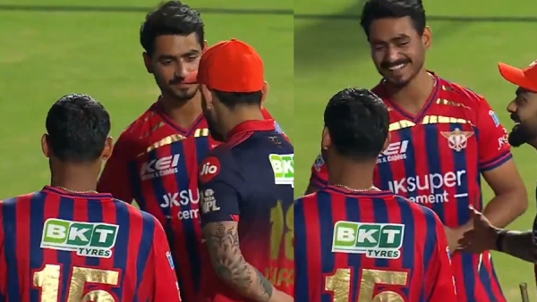 RCB vs LSG IPL 2026 Virat Kohli Stops Youngster Naman Tiwari from Touching His Feet Video Viral RCB vs LSG IPL 2026 Virat Kohli Stops Youngster Naman Tiwari from Touching His Feet Video Viral