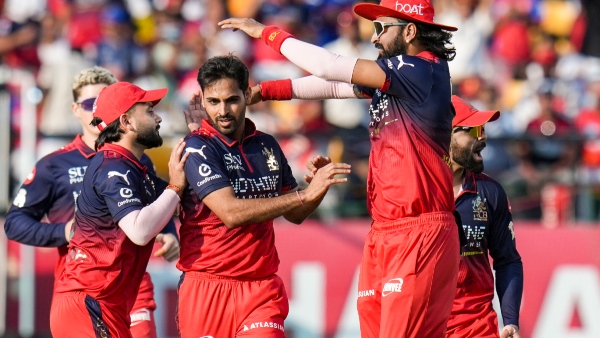 RCB Beat Punjab Kings by 23 Runs Enter IPL 2026 Playoffs After Kohli and Venkatesh Iyer Heroics