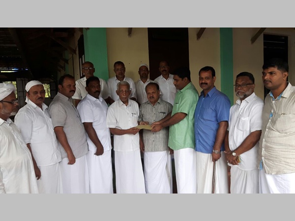 ഫൈസലിന്റെ കുടുംബത്തിനുള്ള പെന്‍ഷന്‍ തുക നാട്ടിലെ സഹായ സമിതിക്ക് കൈമാറി