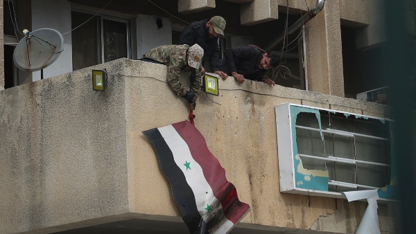 syria president fled to russia