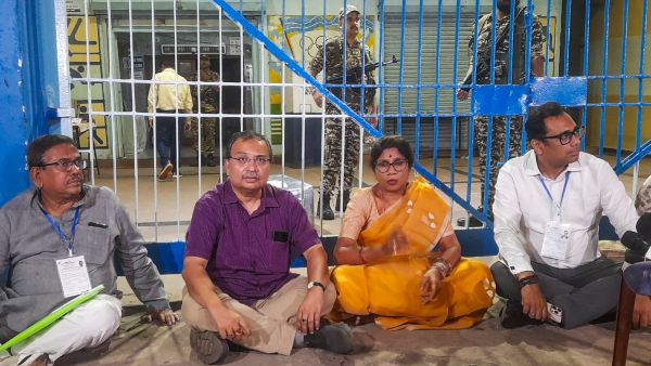 tmc leaders sitting before strongroom