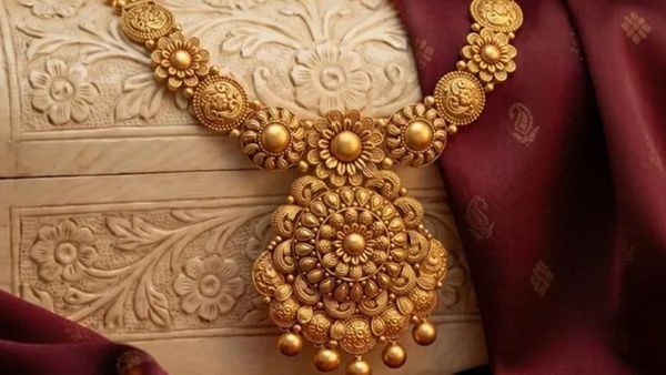 Close up shot of gold jewelry with today s price tag