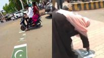 बुरखाधारी महिला रस्त्यावरील पाकिस्तानी झेंडे उचलताना दिसल्या! Video व्हायरल, लोकांचा संताप!