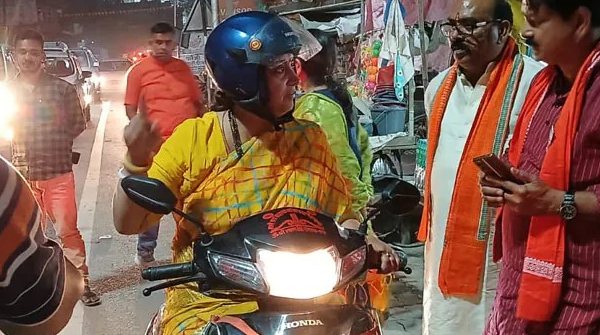 Smriti Irani s Scooter Ride Smriti Irani s Scooter Ride