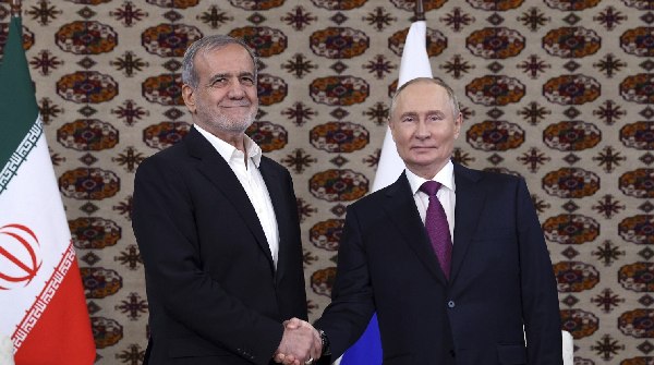 Russia s Putin meets Iran s Pezeshkian