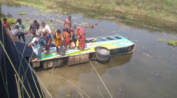 Bus overturns under bridge over 20 injured