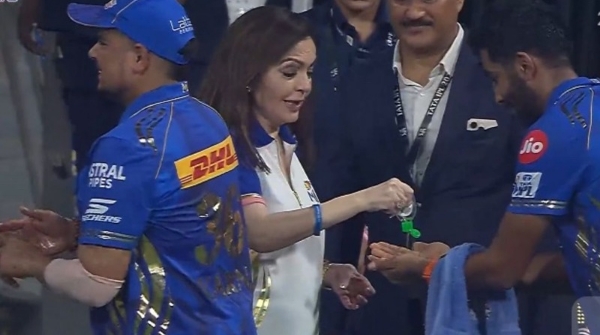 Nita Ambani sanitizes Jasprit Bumrah s hand before shaking hands photo viral