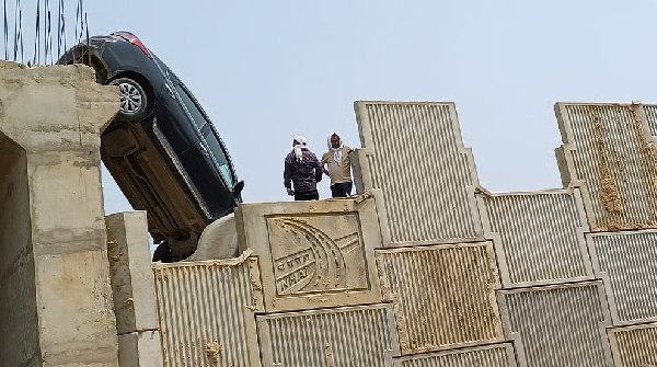 Car hangs mid-air from unfinished flyover in UP