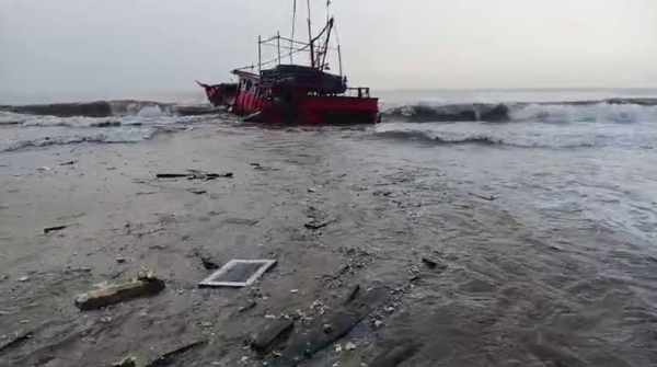 Fishing boat capsizes in the sea